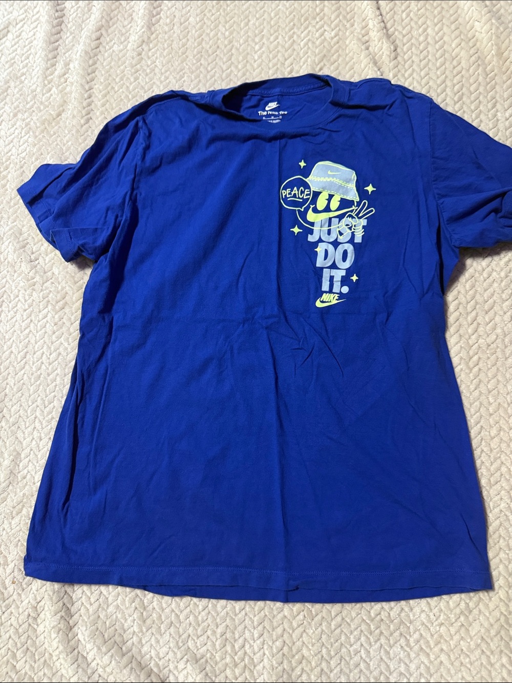 Nike Men’s Blue 'Just Do It' Graphic Tee with Neon Accent